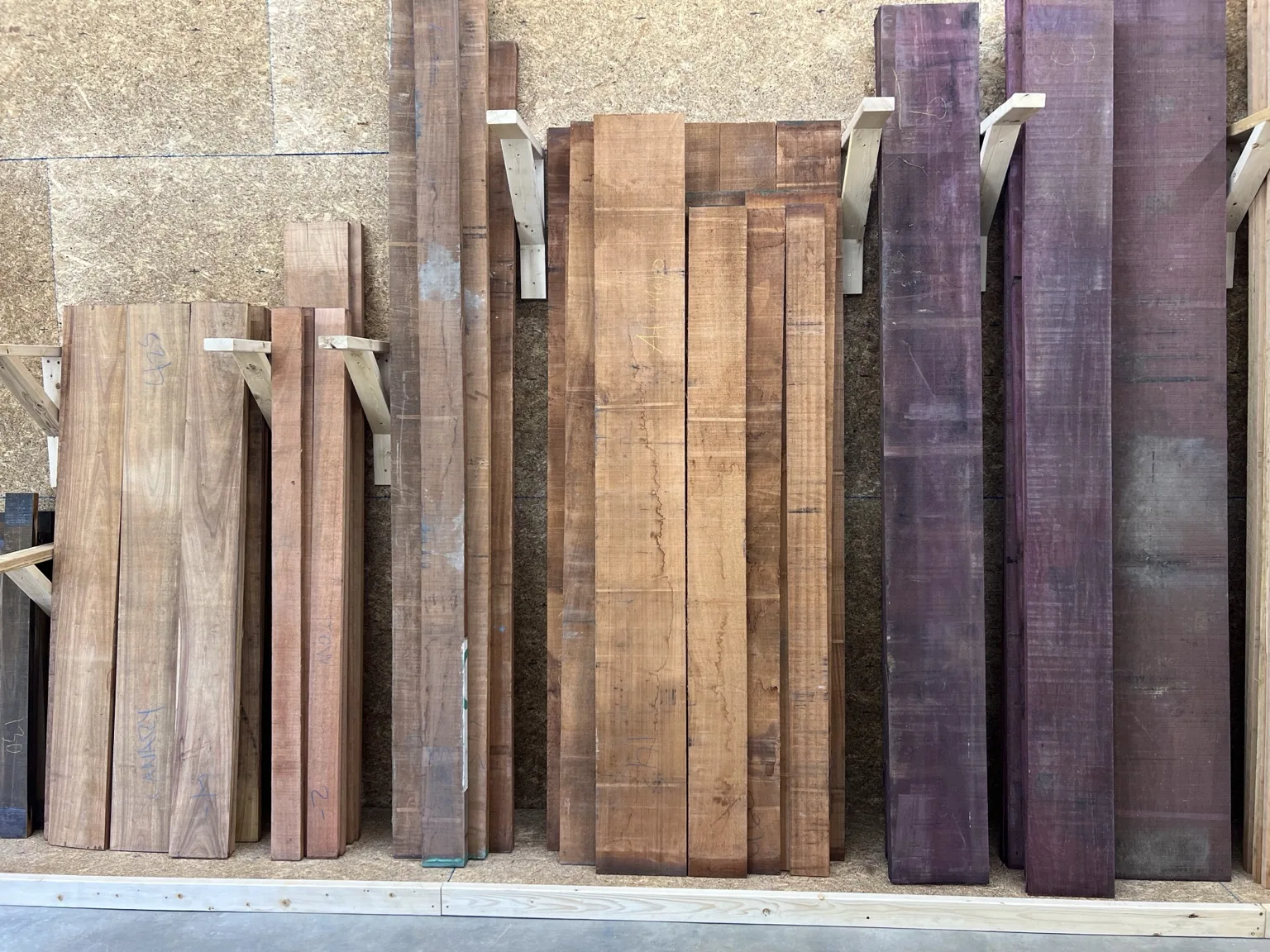 Exotic hardwood lumber boards in the showroom