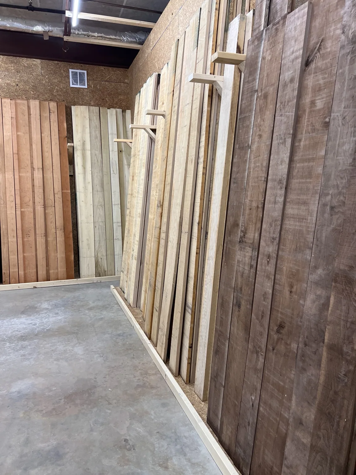 Real vertical hardwood lumber racks at Pruitt Hardwood Lumber Supply