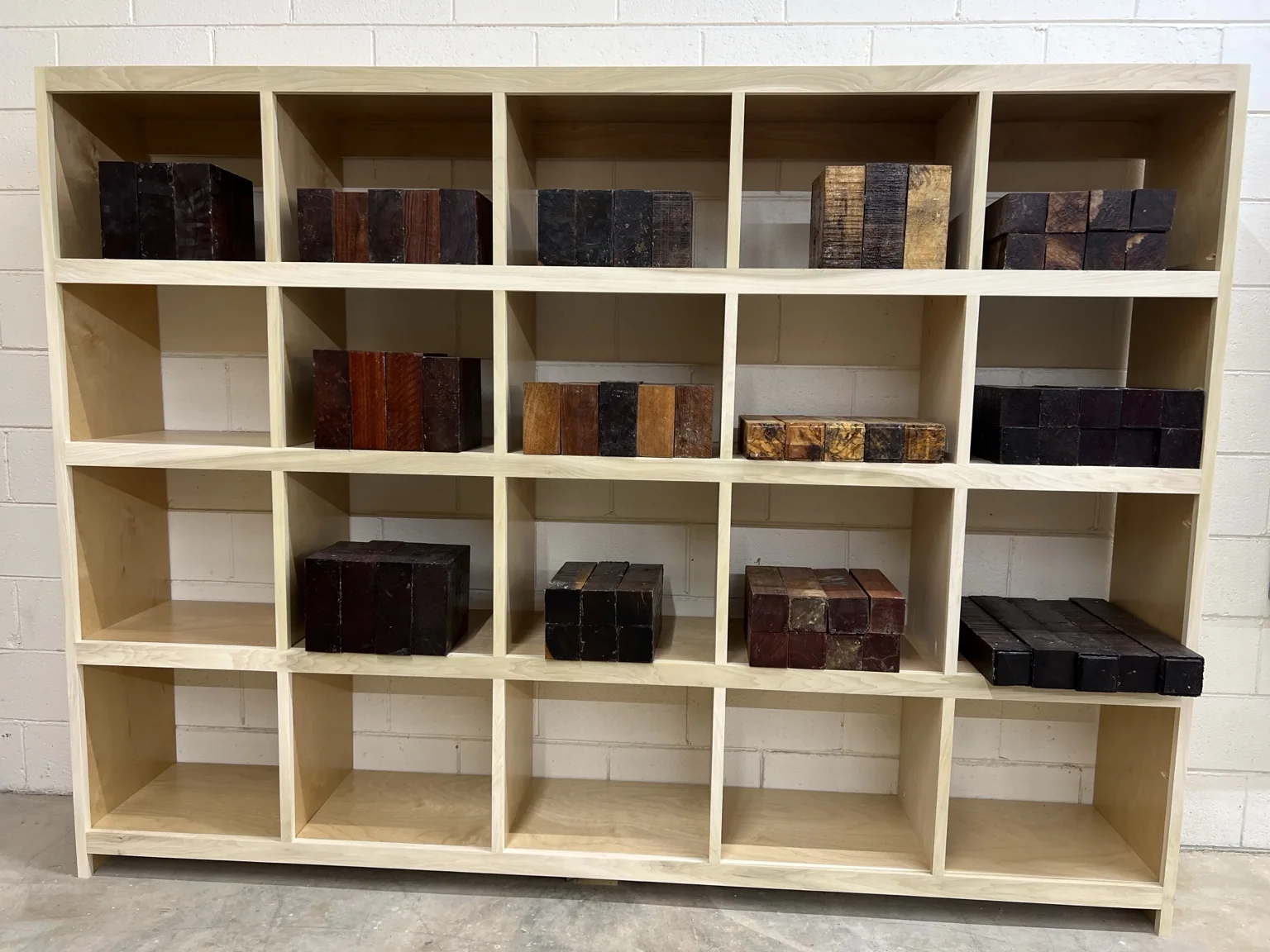 Hardwood turning blanks displayed in cubby shelves